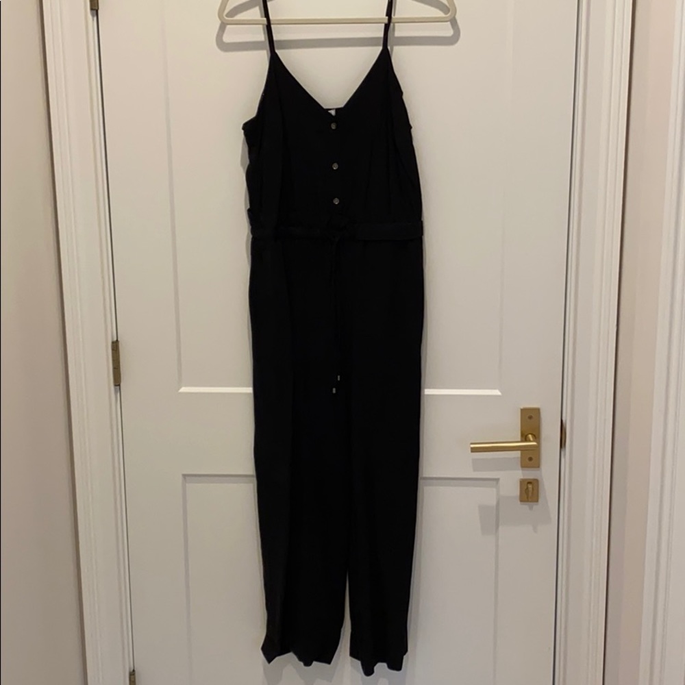 Black jumpsuit sized medium with tie waste